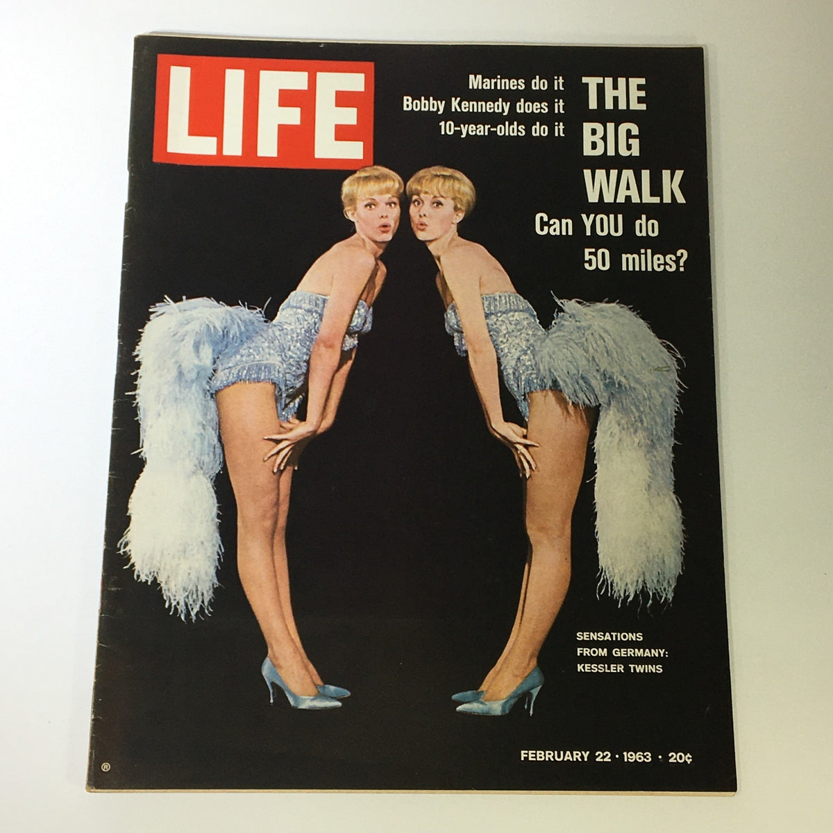 VTG Life Magazine February 22, 1963 featuring the Kesler Twins from Germany on the cover, showcasing their glamorous outfits and feathered accessories.