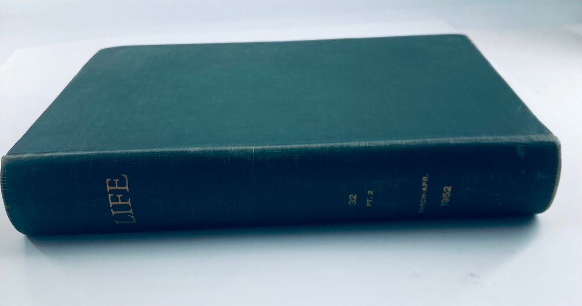 Spine view of the Vintage 1952 Bound Life Magazine, featuring a rich green cover and gold lettering, encapsulating a piece of history.