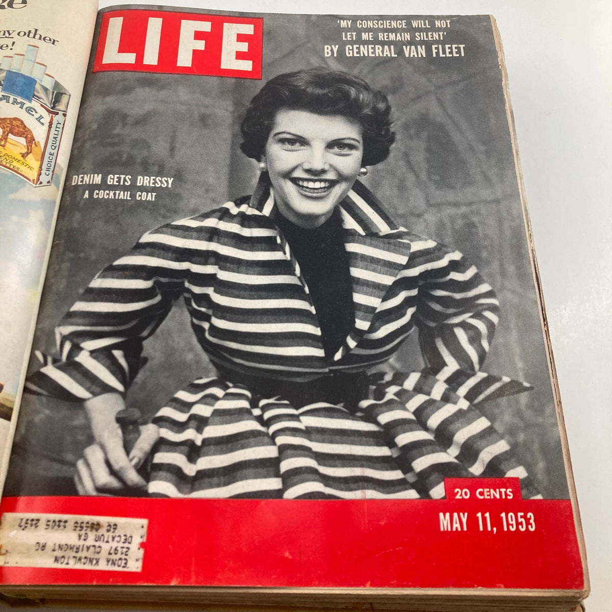 Vintage 1953 Bound LIFE Magazine cover from May 11, 1953, featuring a woman in a striped dress, reflecting fashion trends of the 1950s.