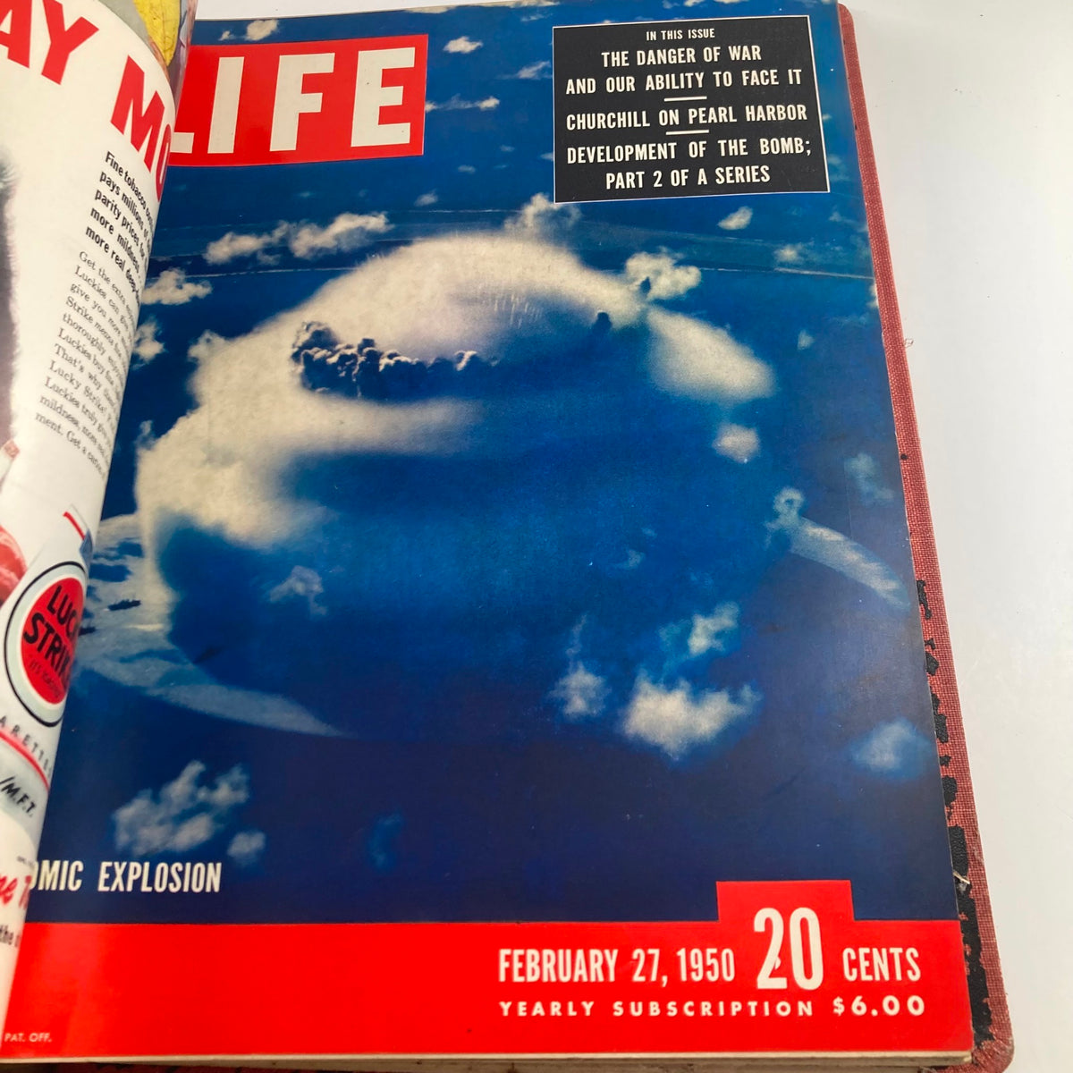Vintage 1950 LIFE Magazine cover illustrating a cloud of smoke from a nuclear explosion, dated February 27, 1950, addressing post-war concerns.