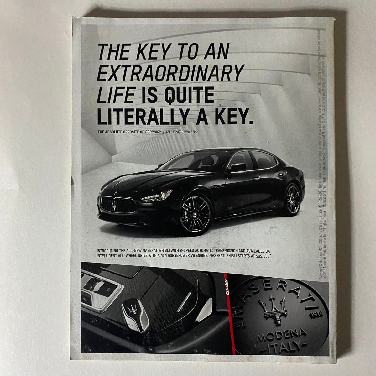 Advertisement page from Fortune Magazine December 9, 2013, highlighting the Maserati Ghibli luxury car with its key detail.