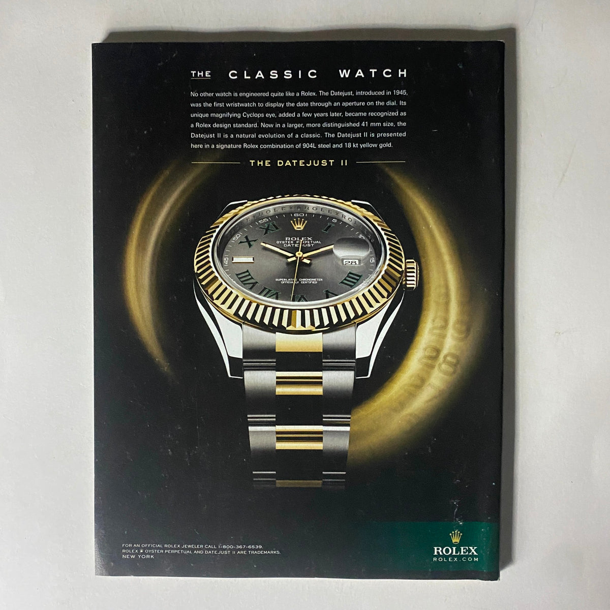 Advertisement for Rolex watch from Fortune Magazine September 27, 2010, showcasing luxury timepieces and brand prestige.