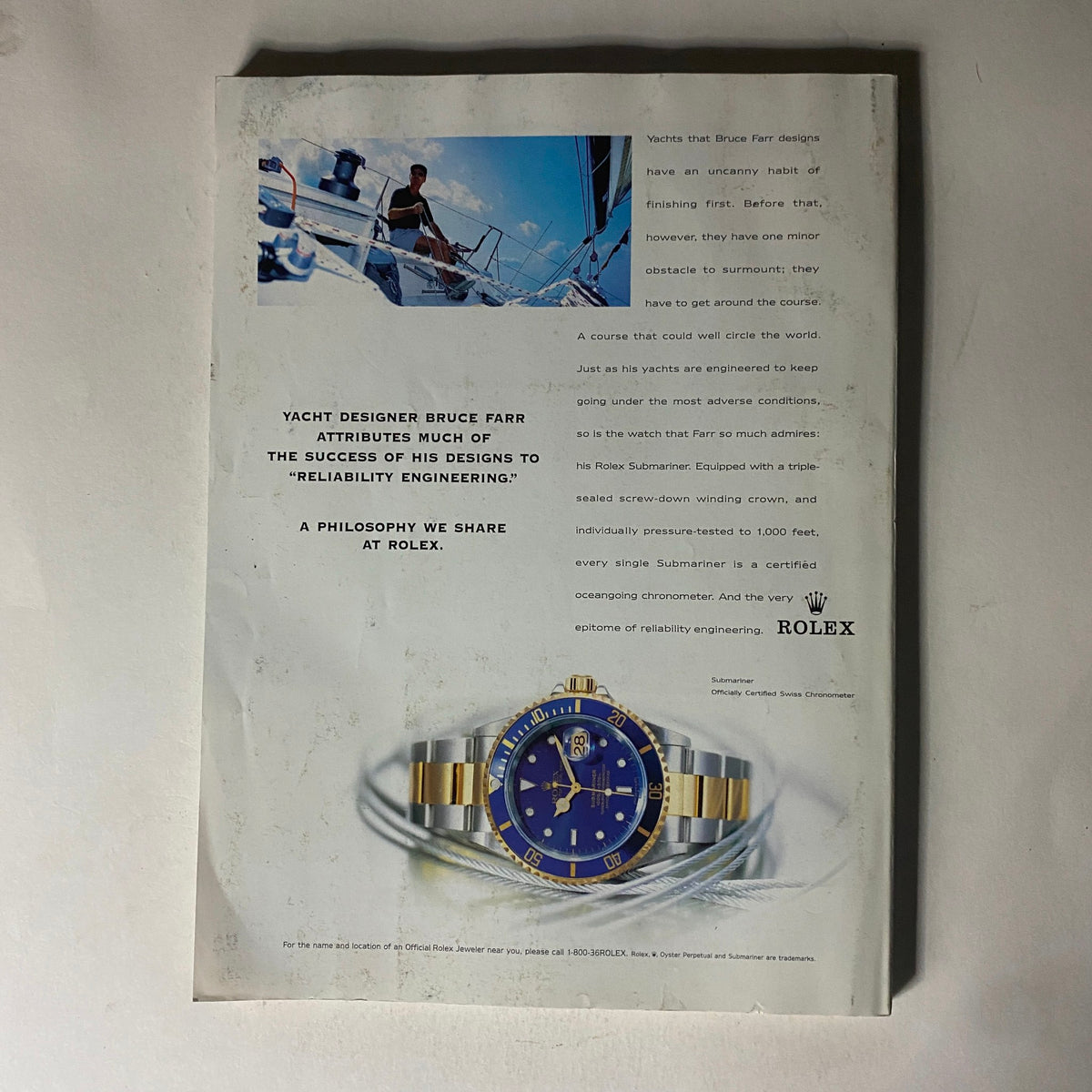 Back cover of Fortune Magazine May 25, 1998, showcasing an advertisement for Rolex, featuring a luxury watch and a yacht designer, emphasizing reliability engineering.
