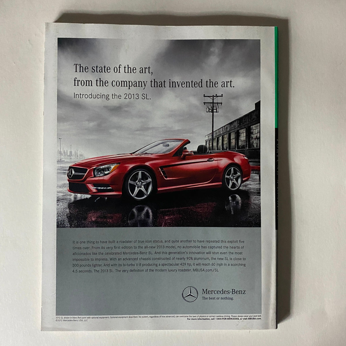 Advertisement for the 2013 Mercedes-Benz SL in Fortune Magazine July 23, 2012, showcasing the luxury car in a stylish setting.