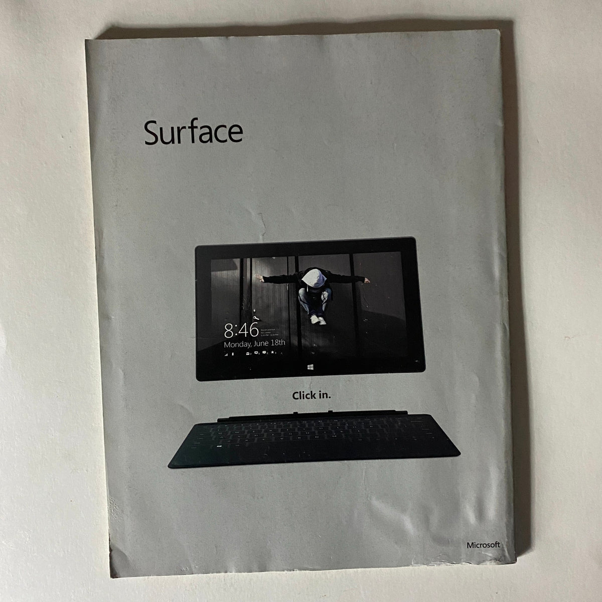 Advertisement for Microsoft Surface featured in Fortune Magazine February 25, 2013, showcasing the device and inviting users to 'Click in'.