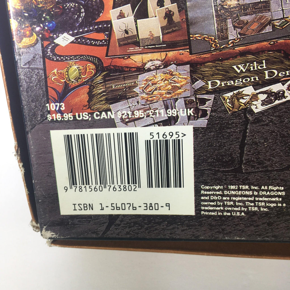 Back cover of TSR Board Game: Dungeons & Dragons Game The Dragon's Den showcasing game components and barcodes for authenticity.