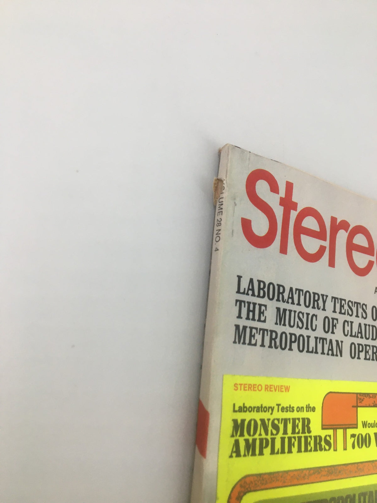 Side view of the VTG Stereo Review Magazine April 1972, emphasizing the magazine's spine and title, The Super-Amplifier Lab Test, with visible vintage wear.