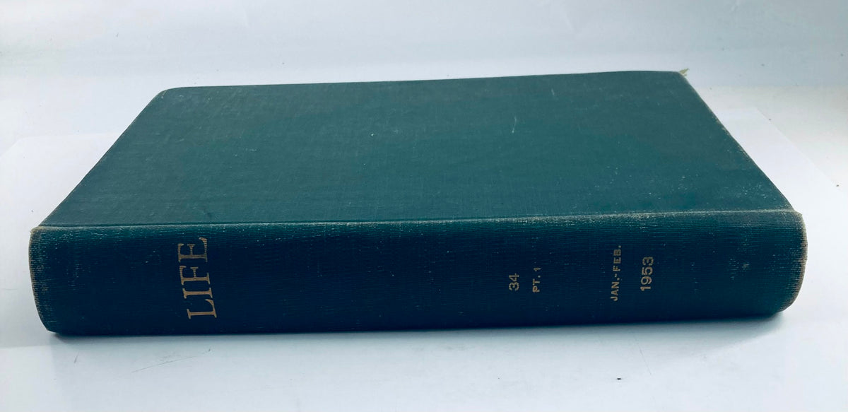 Side view of the VTG 1953 Bound Life Magazine January - February Weekly Issue, highlighting the gold-stamped title and year on a green linen cover.