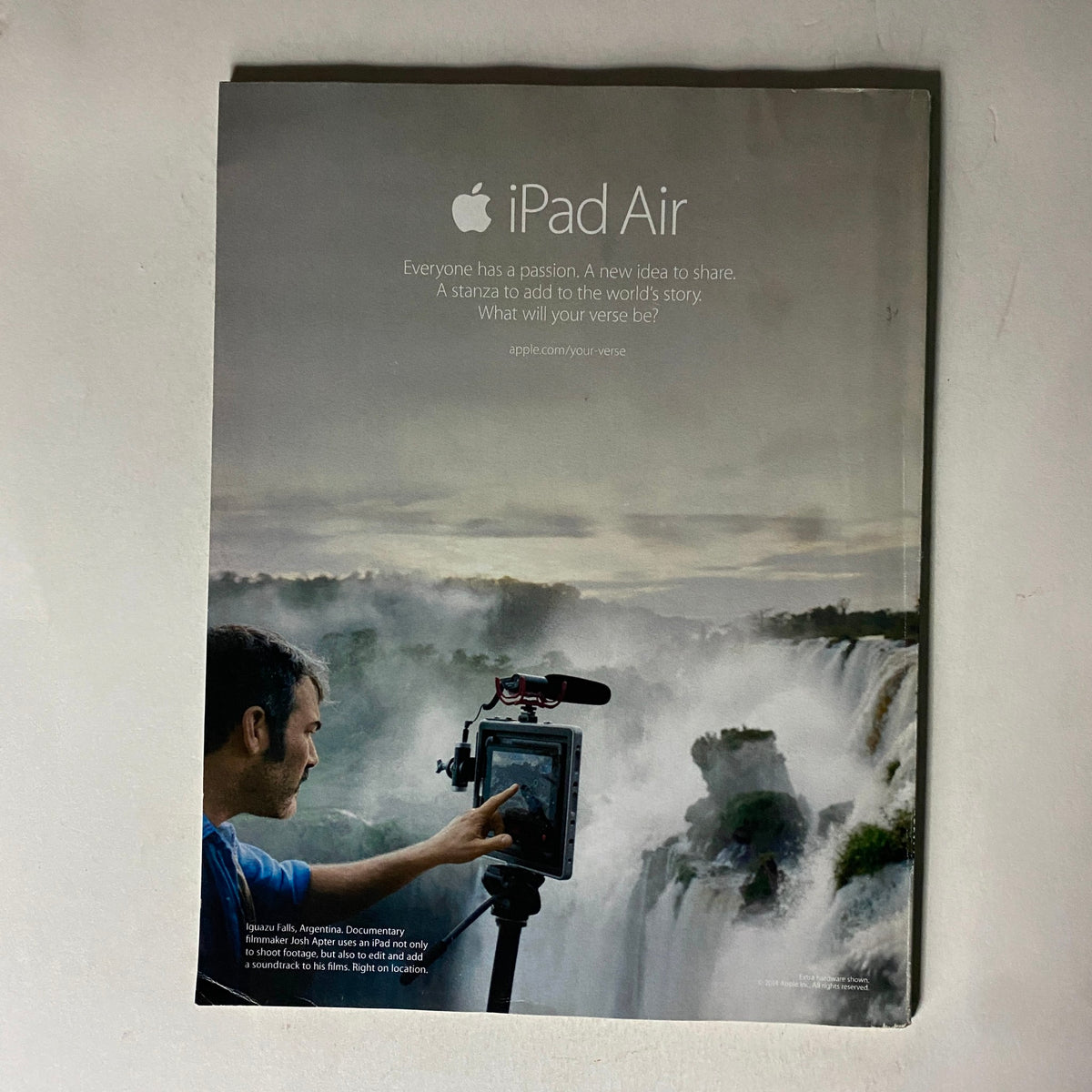 Back cover of Fortune Magazine April 28, 2014 featuring an advertisement for the Apple iPad Air with a scenic waterfall backdrop.