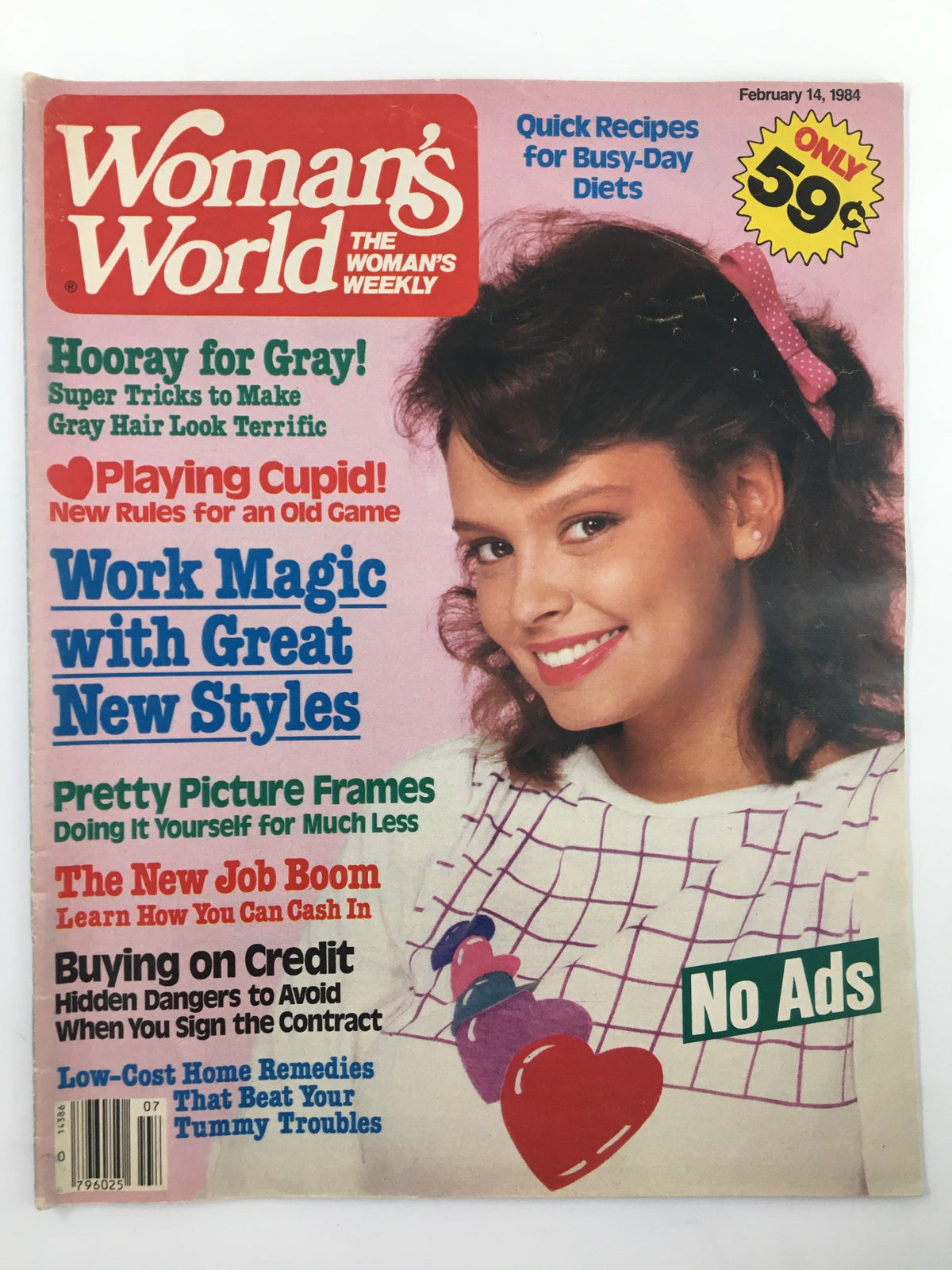 Cover of Woman's World Magazine February 14 1984 featuring the title 'Work Magic w Great New Styles' with a model wearing a stylish outfit and heart-themed graphics, highlighting articles on beauty and recipes.