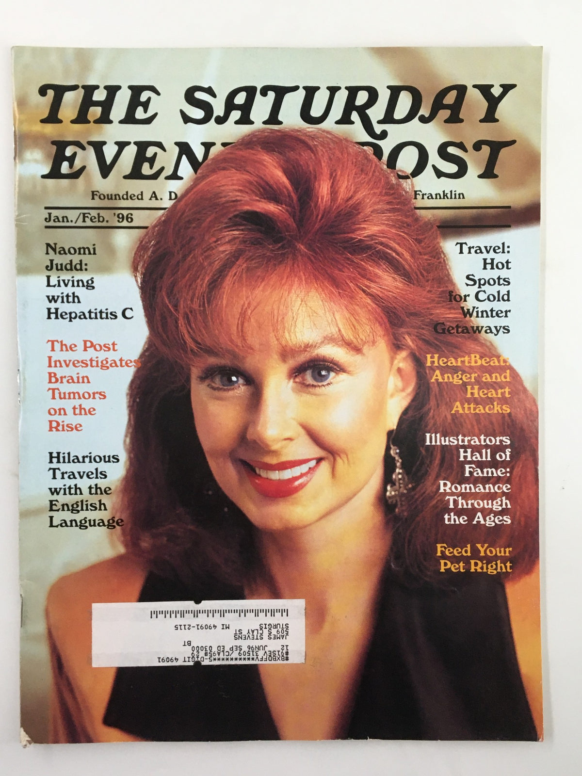 Cover of The Saturday Evening Post, January 1996 issue featuring Naomi Judd, highlighting her story 'Living with Hepatitis C'. The magazine showcases an engaging portrait of Judd with vibrant red hair and includes various articles and features from the 90s.