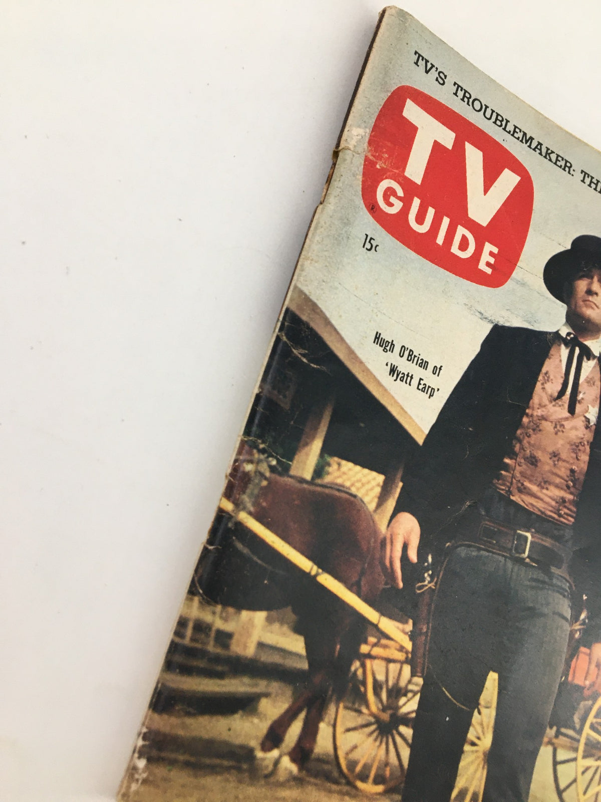 Close-up of the cover of TV Guide Magazine May 2 1959 with Hugh O'Brian's portrayal of Wyatt Earp and the iconic TV Guide logo.