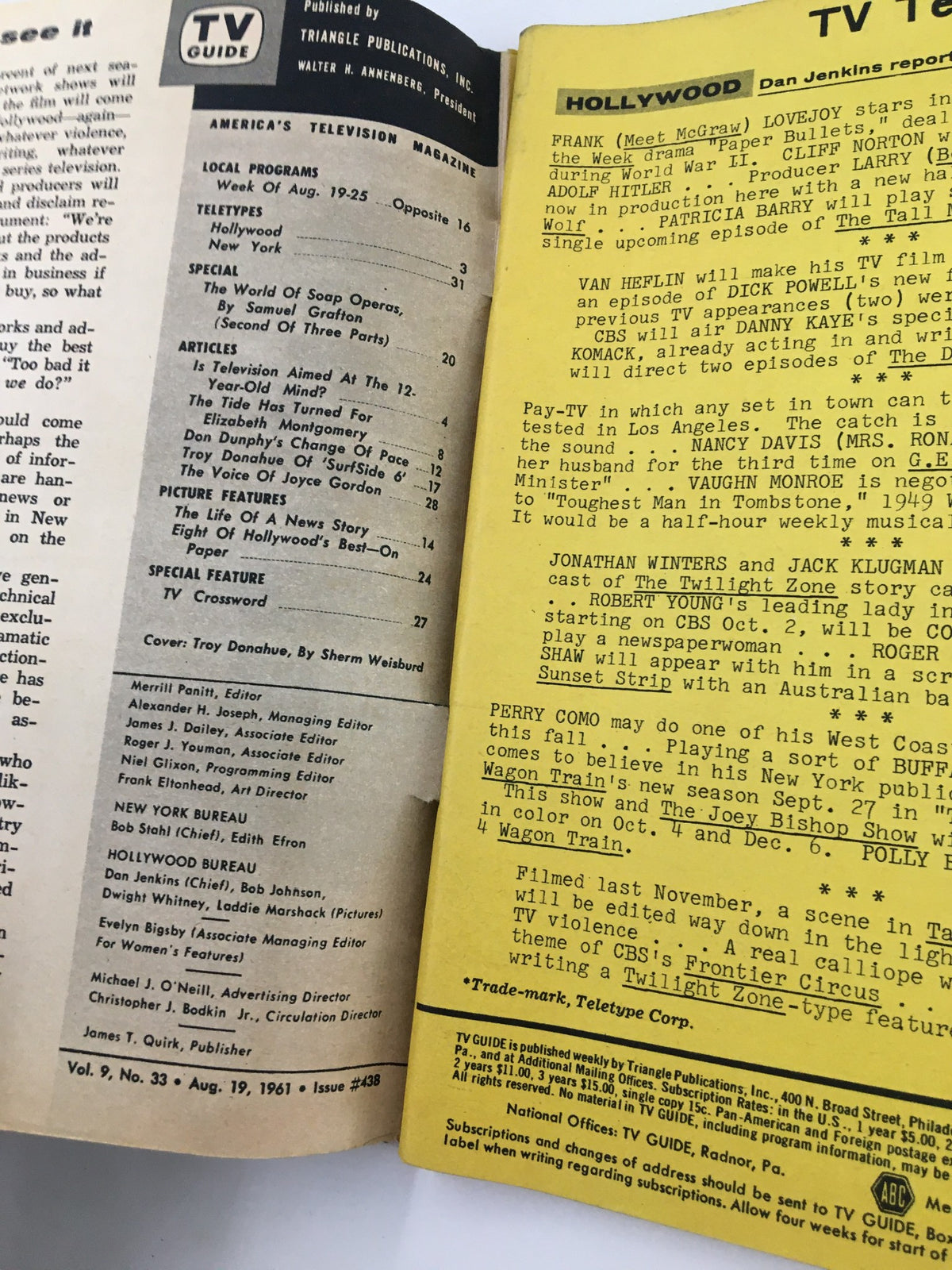 Inside pages of TV Guide Magazine August 19 1961 showing TV listings and articles, featuring Troy Donahue. A peek into vintage television history.