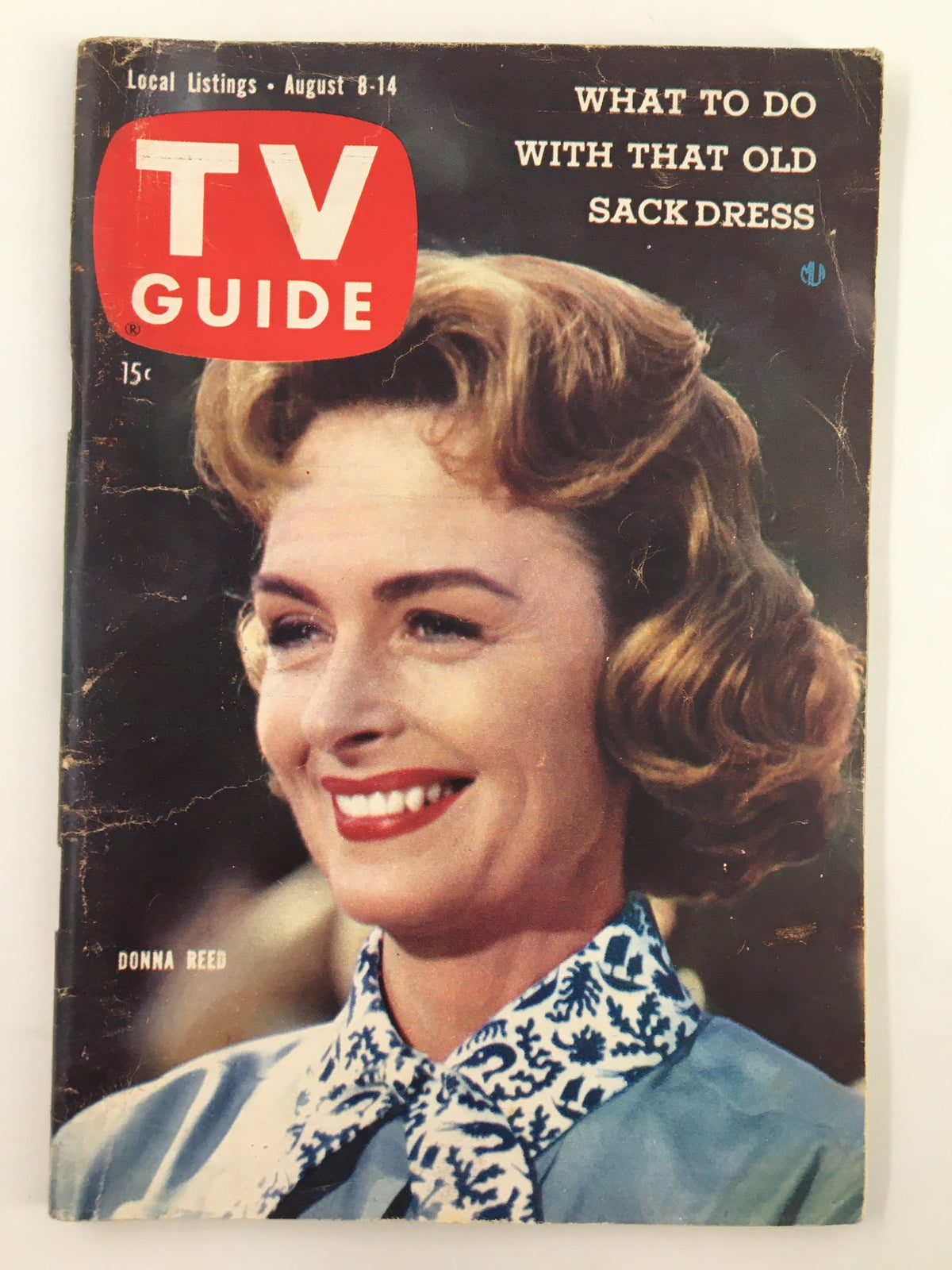 Cover of TV Guide Magazine from August 8, 1959 featuring Donna Reed, with the headline 'What to Do With That Old Sack Dress' depicting the iconic look of the late 1950s.