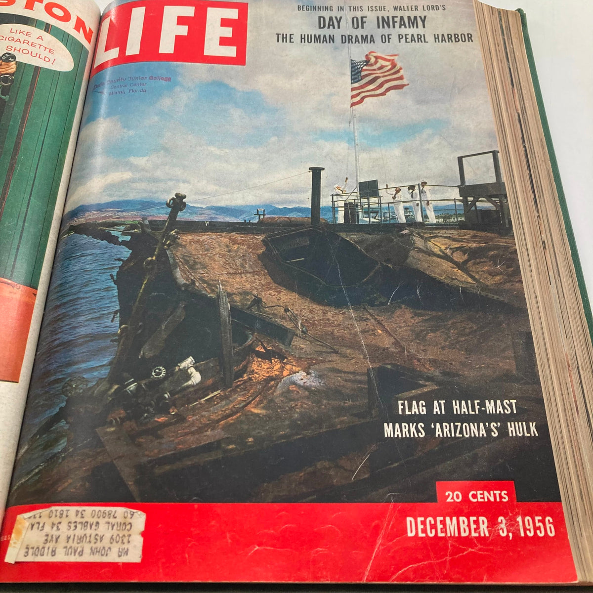Vintage 1956 Bound LIFE Magazine featuring a cover from December 3, 1956, showcasing the wreck of the U.S.S. Arizona with an American flag at half-mast.