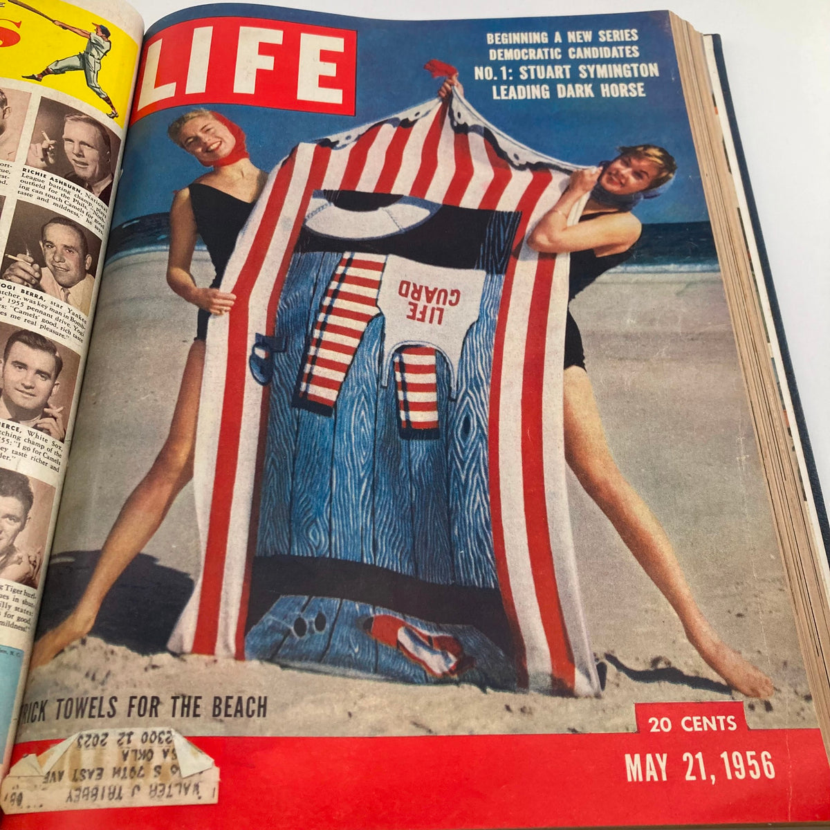 Vintage 1956 Bound Life Magazine cover presenting a beach scene with women holding a large striped towel, dated May 21, 1956.