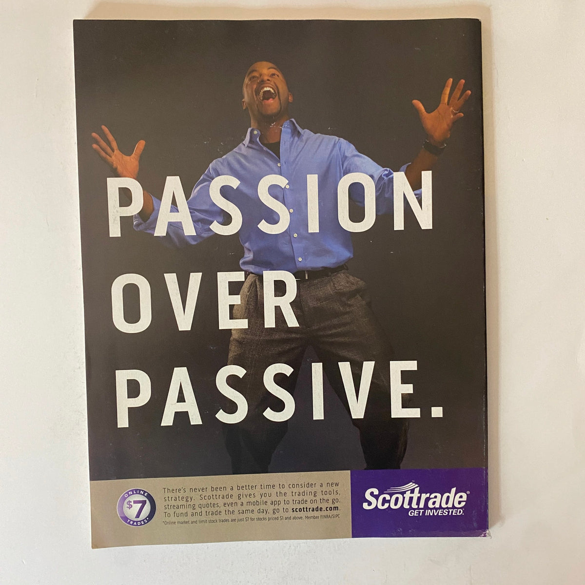 Back cover of Fortune Magazine July 4, 2011 featuring an advertisement with the text 'Passion Over Passive' for Scottrade.