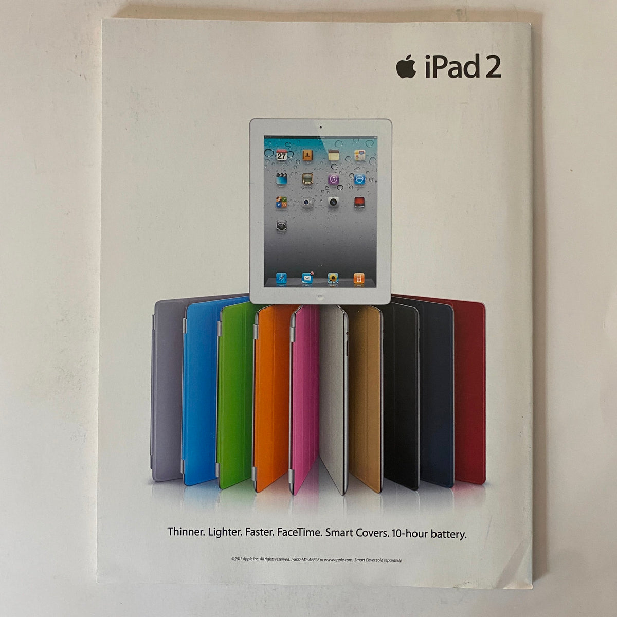 Fortune Magazine May 2, 2011 cover featuring the iPad 2 advertisement, showcasing various colors and emphasizing its features: thinner, lighter, faster with a 10-hour battery life.
