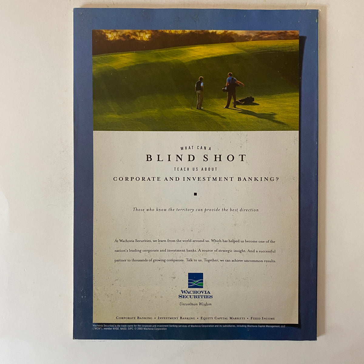 Back cover of Fortune Magazine August 11, 2003 illustrating a golf course with two individuals, advertising Wachovia Securities and themed around corporate and investment banking.