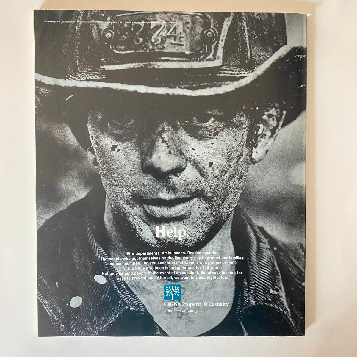 Back cover of Fortune Magazine December 26, 1994, showcasing an advertisement for CIGNA Property & Casualty, highlighting themes of community and protection.