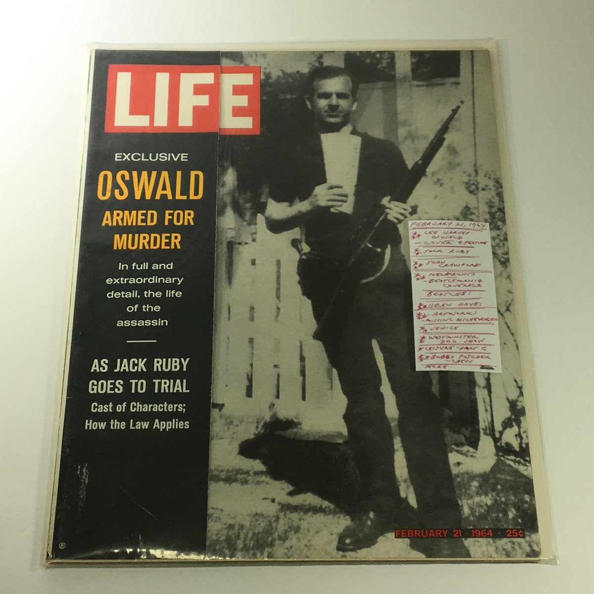 VTG Life Magazine February 21 1964 showcasing Lee Harvey Oswald on the cover, with additional details and notes on significant historical events of the time.