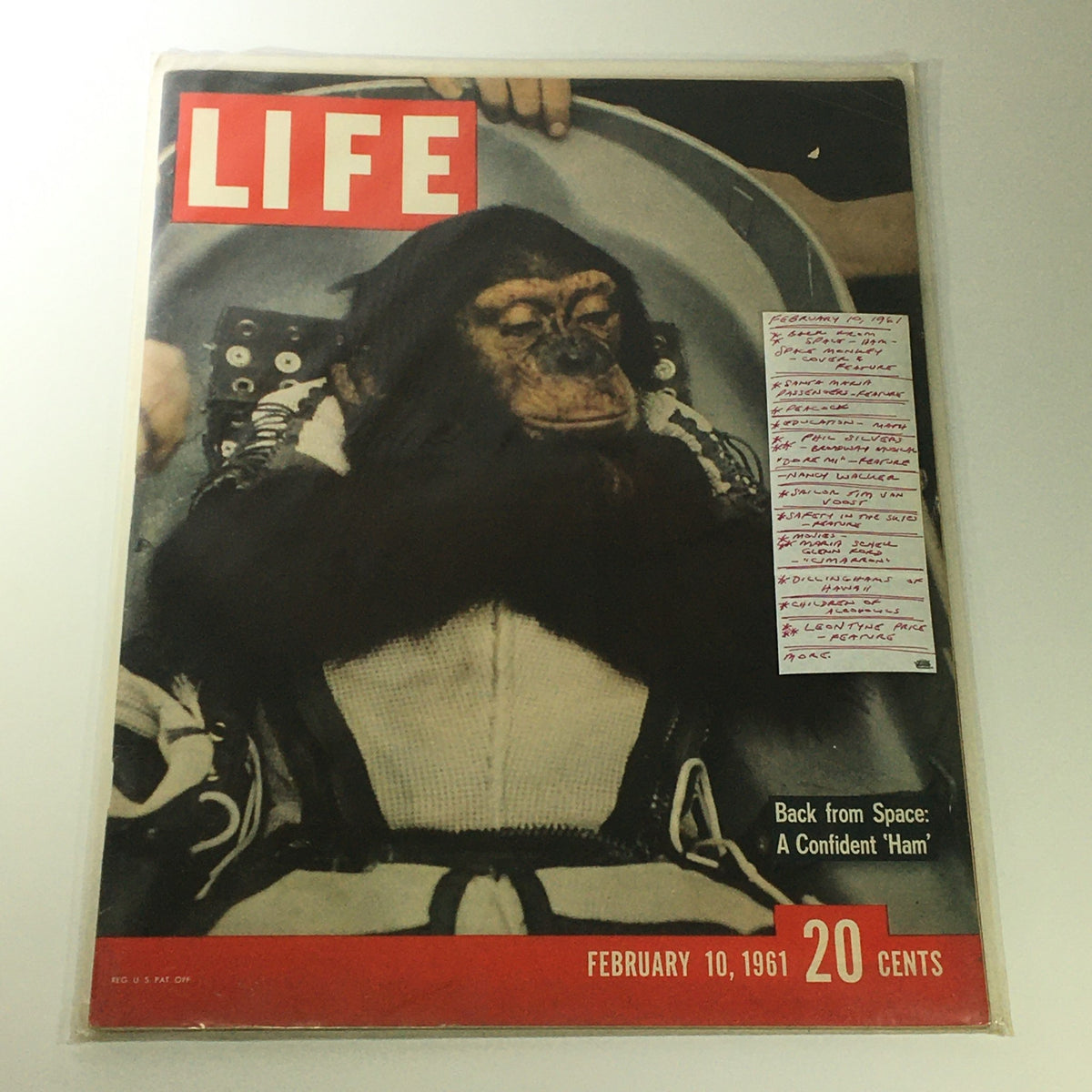 VTG Life Magazine February 10 1961 cover showcasing Ham, the first chimp in space, with a handwritten note detailing content inside, emphasizing the significant historical moment.