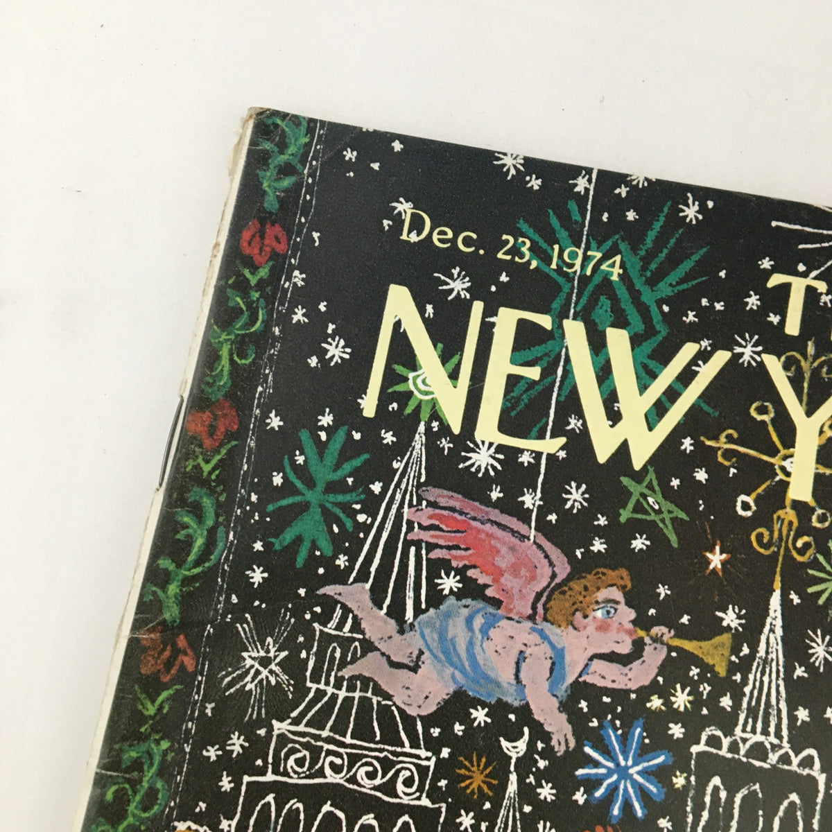 Detail of The New Yorker Magazine December 23 1974 cover showing the title and illustration, highlighting an angel playing a trumpet against a snowy backdrop, associated with William Steig's 'Santa's List'.