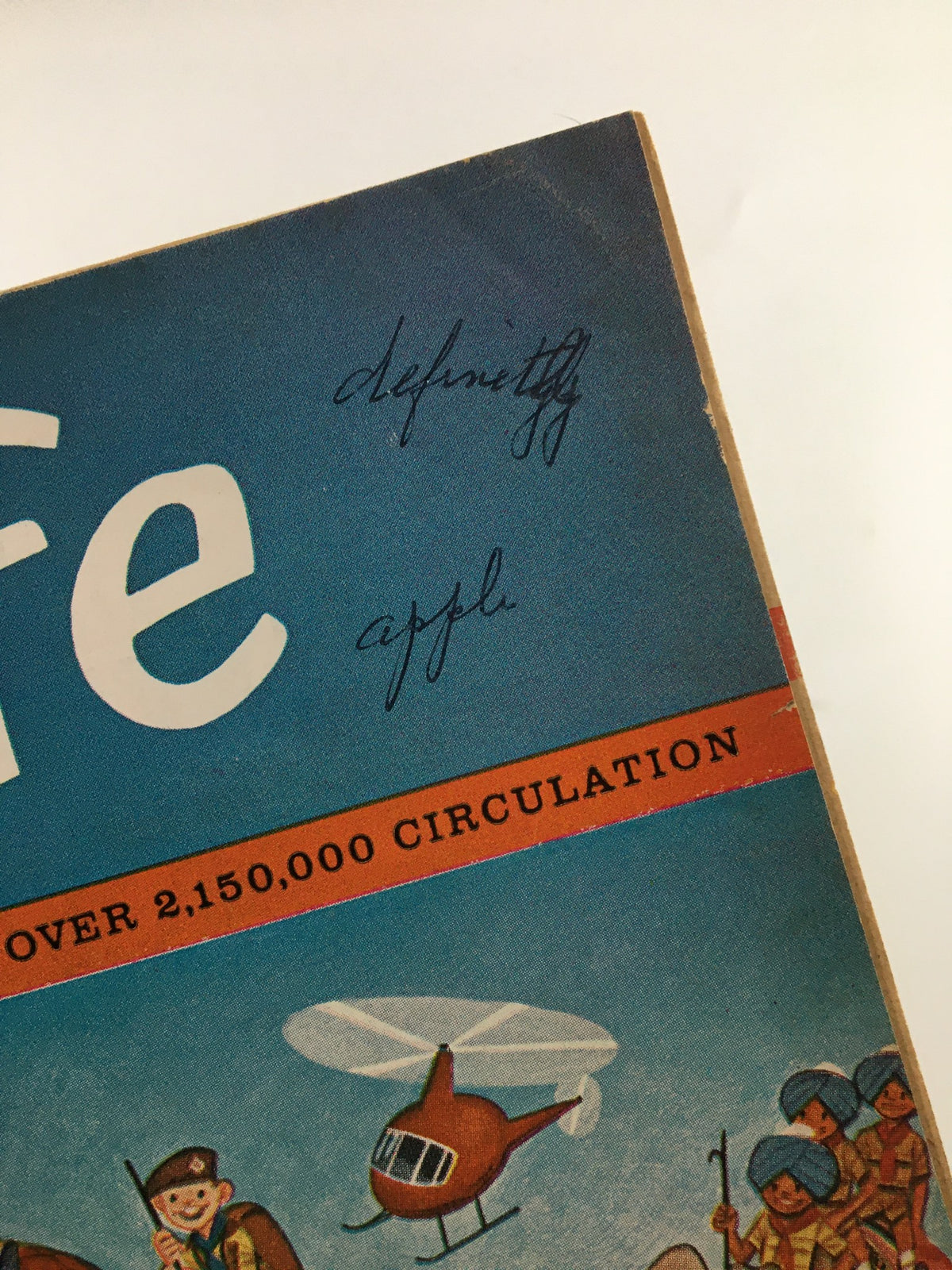 Detail of the Boys' Life Magazine cover, July 1963, showcasing handwritten notes alongside colorful illustrations of scouting adventures.
