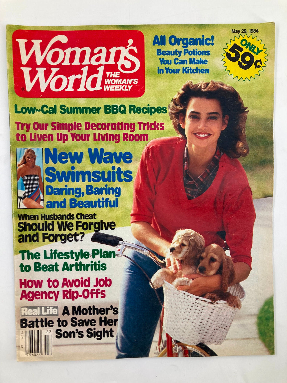 Cover of Woman's World Magazine, May 29, 1984, featuring a lifestyle plan to beat arthritis, with a woman holding puppies on a bicycle, promoting summer BBQ recipes and beauty tips.
