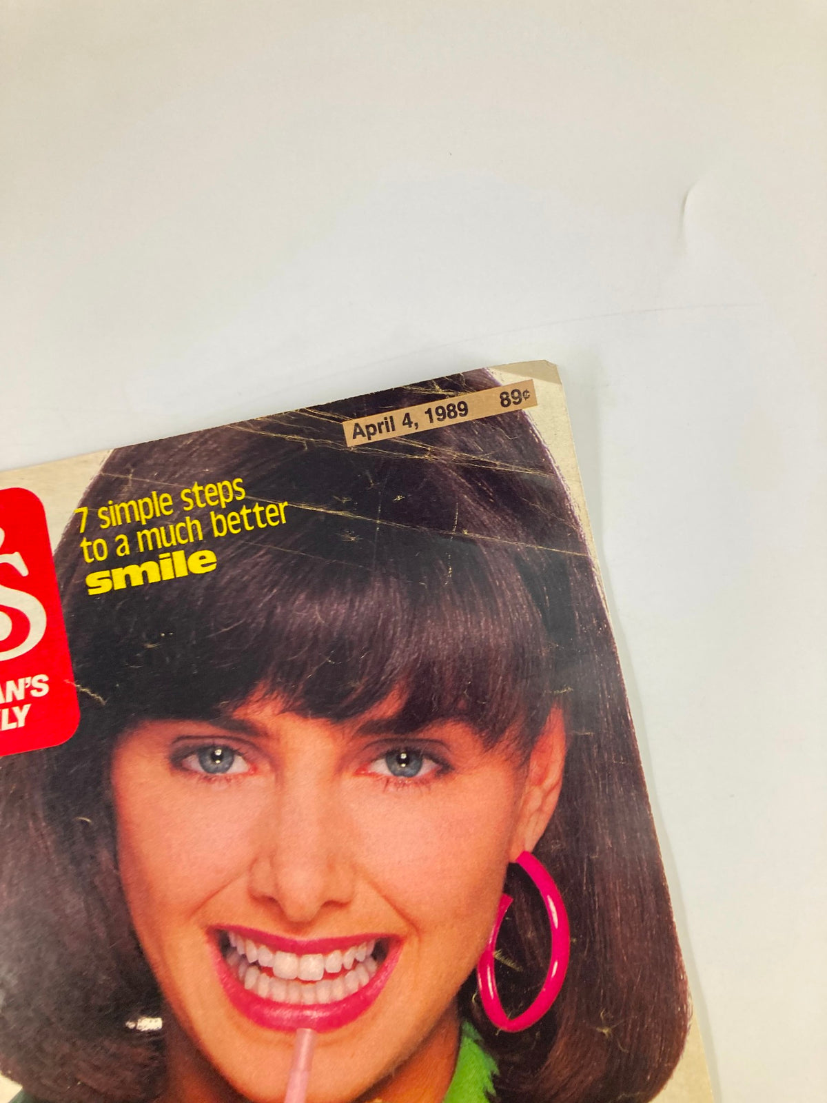 Close-up of the top corner of Woman's World Magazine April 4 1989, highlighting the date and price.