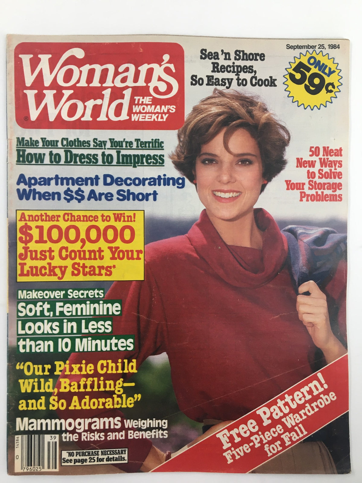 Woman's World Magazine from September 25, 1984, featuring the article 'How to Dress to Impress,' showcasing a stylish woman in a red top on the cover.