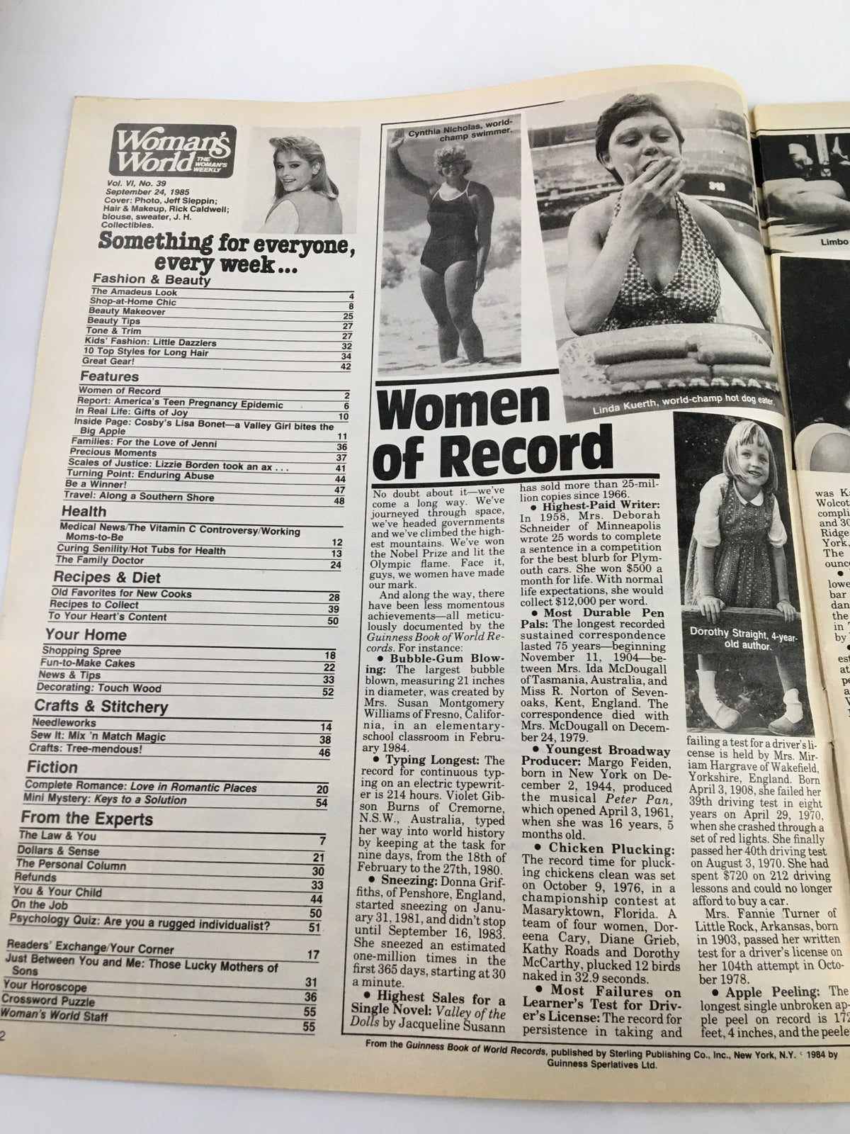 Page from Woman's World Magazine, September 24, 1985, featuring an article titled 'Women of Record' highlighting achievements of women, with images of Cynthia Nicholas, world champion swimmer, and Linda Kuerth, world champion hot dog eater. The magazine discusses cultural topics relevant to America's Teen Pregnancy issue.