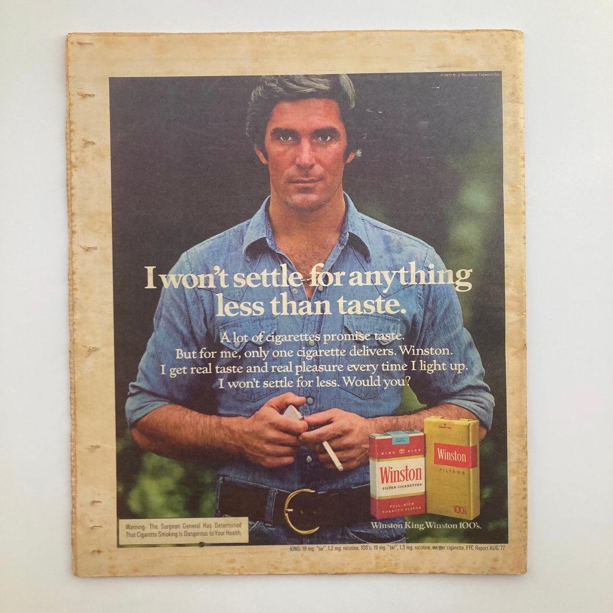 Back page advertisement from VTG Rolling Stone Magazine March 23, 1978, No. 261 featuring a Winston cigarette ad with a man holding a cigarette and a Winston pack, emphasizing taste.