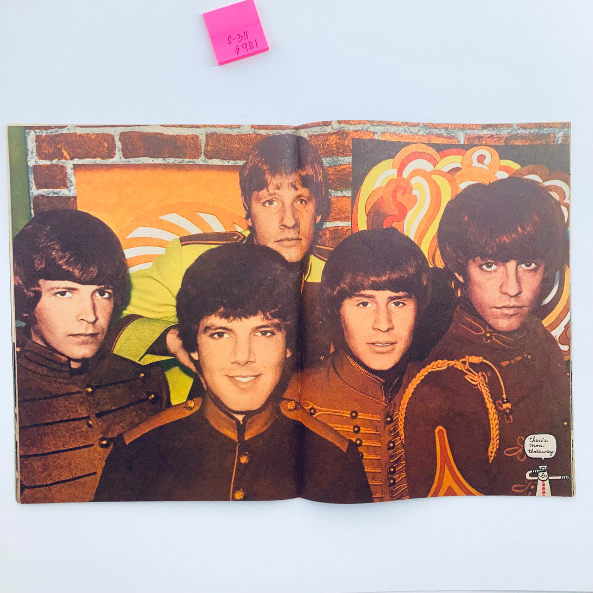 Inside spread of VTG 16 Magazine November 1967 displaying a vibrant photo of The Monkees with a retro design.