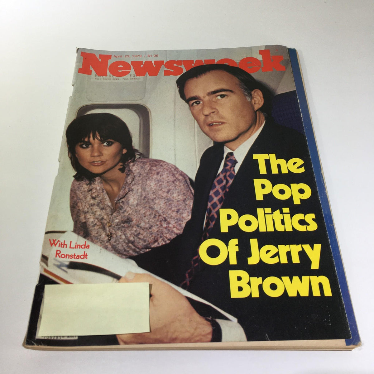 Newsweek Magazine cover from April 23, 1979, featuring the headline 'The Pop Politics Of Jerry Brown.' The cover shows a woman with dark hair wearing a patterned blouse alongside a man in a suit, reflecting the cultural and political context of the late 1970s.