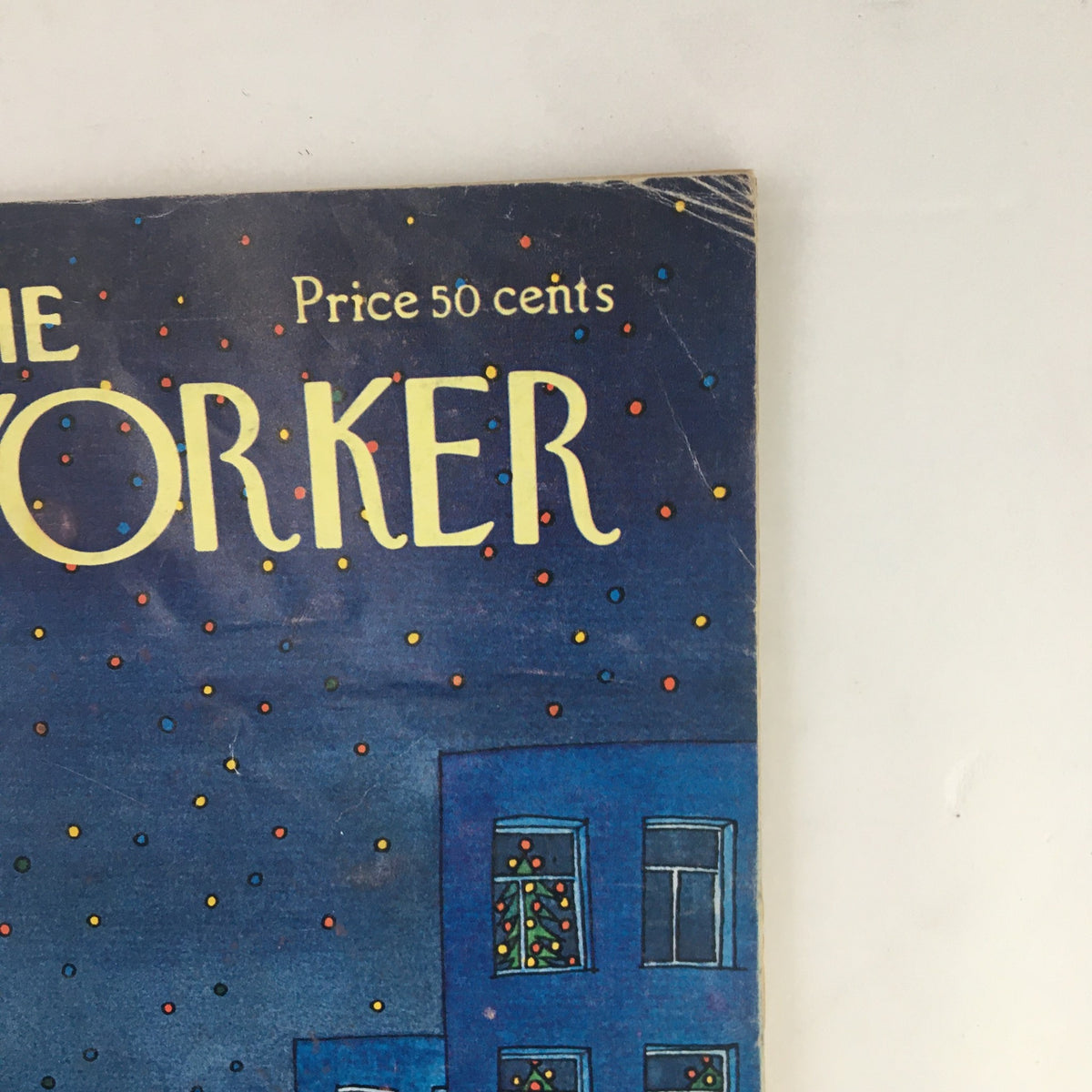 Top portion of The New Yorker Magazine December 17, 1973 cover, displaying the magazine title and price, along with festive starry background.