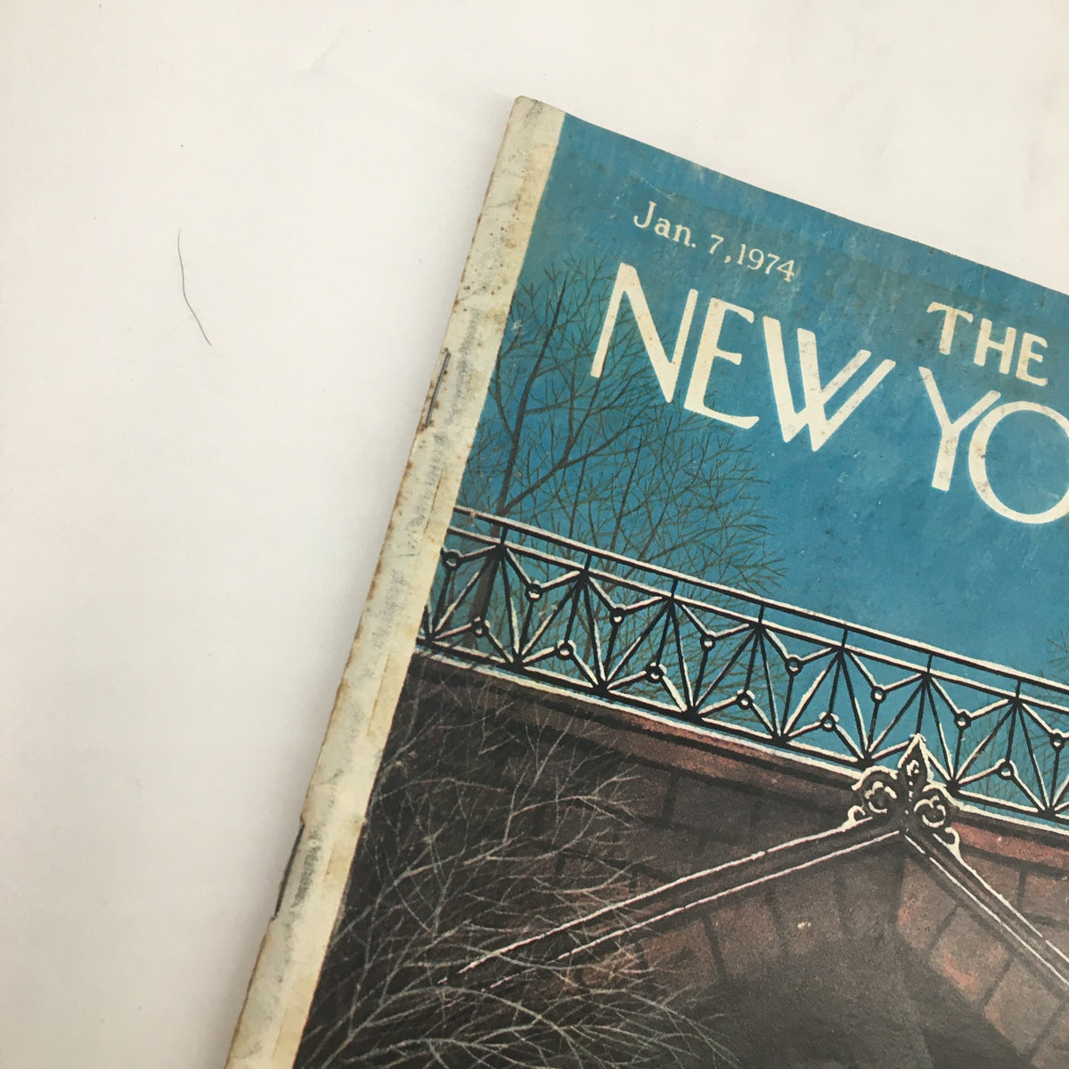 Cover of The New Yorker Magazine dated January 7, 1974, featuring the artwork 'Footprints in the Snow' by Charles E. Martin, showcasing a winter scene with a blue sky and trees.