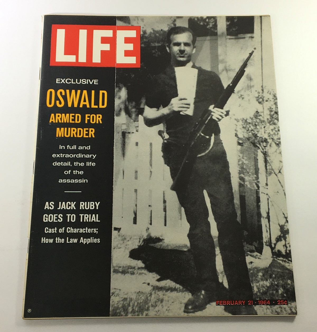 Cover of the VTG Life Magazine from February 21, 1964 featuring Lee Harvey Oswald, with the headline 'OSWALD ARMED FOR MURDER' and an image of Oswald holding a rifle.