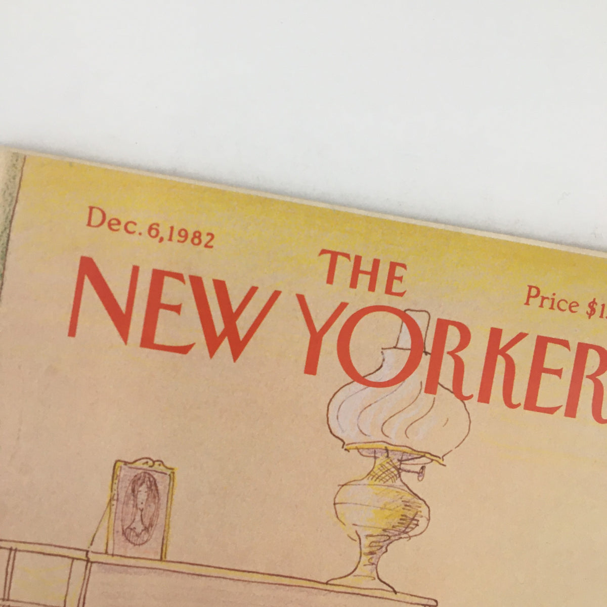 Close-up of The New Yorker Magazine cover from December 6, 1982, highlighting the title and an artistic lamp design by Eugene Mihaesco.