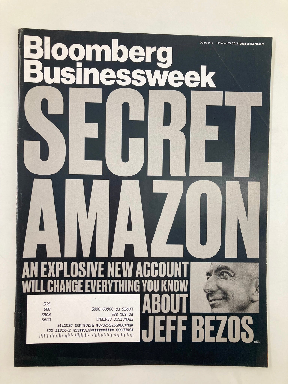 Bloomberg Businessweek Magazine October 14 2013 cover featuring an article titled 'Secret Amazon' about Jeff Bezos, highlighting Amazon's groundbreaking business strategies. The magazine showcases a bold design and is a vintage collectible relevant for fans of business and technology.