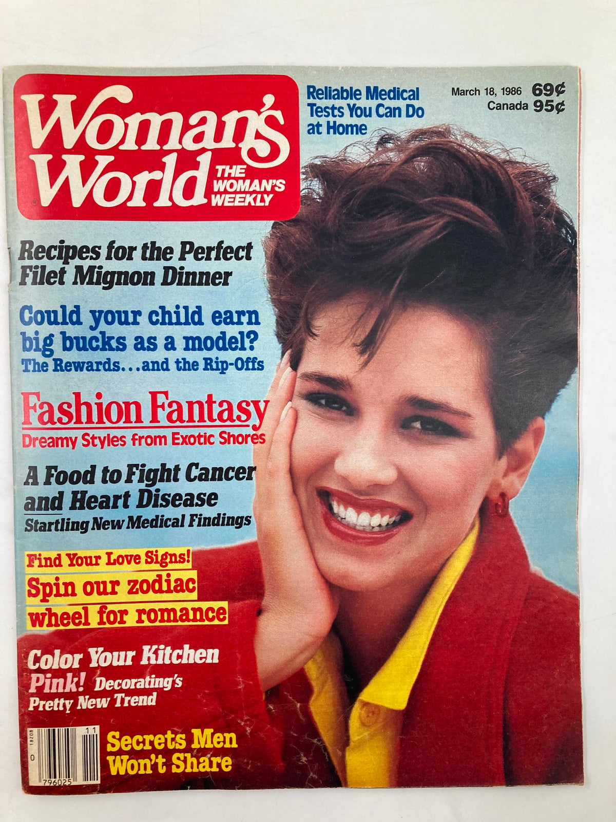 Cover of Woman's World Magazine March 18 1986 featuring the title 'Woman's World Magazine March 18 1986 Zodiac Wheel for Romance' with colorful headlines about recipes, medical tests, and fashion, showcasing a woman smiling with short hair.