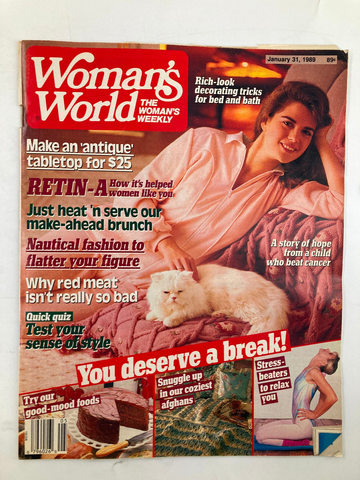 Cover of Woman's World Magazine dated January 31, 1989, featuring a smiling woman with long hair, a white cat on a cozy blanket, and headlines about antique tabletops, beauty tips, and stress relief.