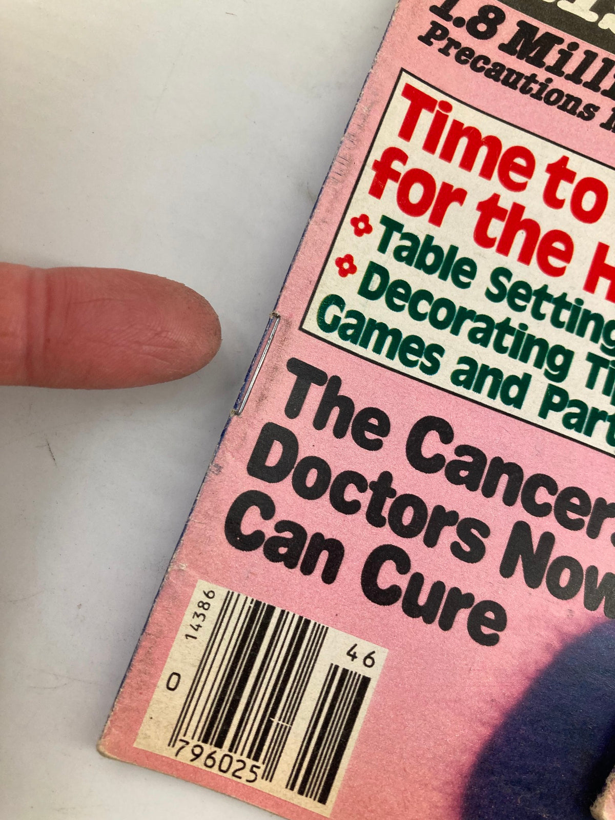Side view of the November 13, 1984 issue of Woman's World Magazine, showing details of the magazine's cover, including the barcode and promotional text about health topics.