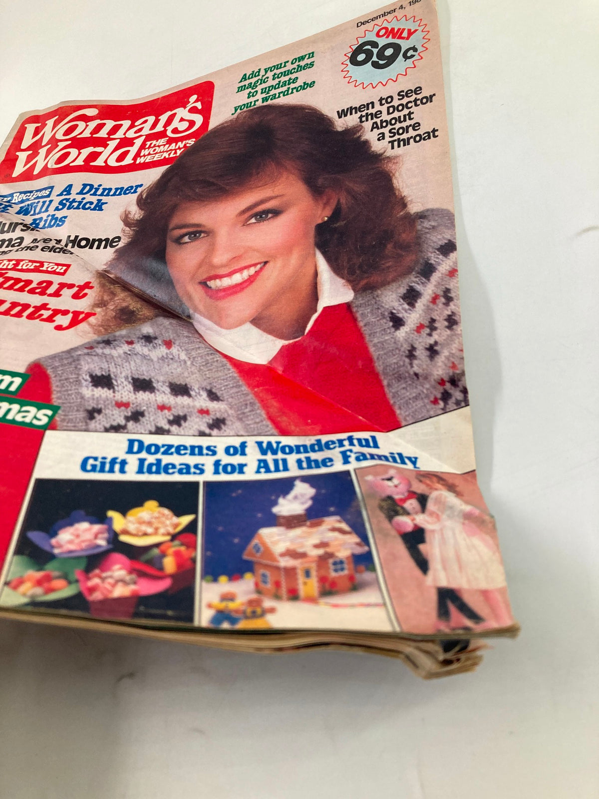 Close-up of the December 4, 1984 cover of Woman's World Magazine, showcasing the title 'City Smart and Country Casual' with emphasis on fashion and holiday decorations.