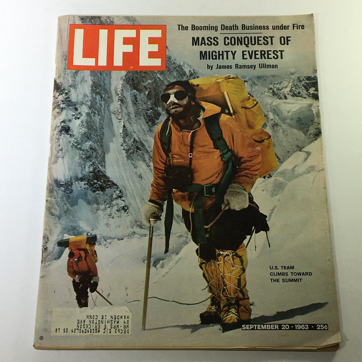 Cover of Life Magazine from September 20, 1963 featuring the headline 'Mass Conquest of Mighty Everest'. The image shows a mountaineer in gear climbing snowy terrain with a dramatic mountain backdrop, illustrating the adventure of climbing Everest.