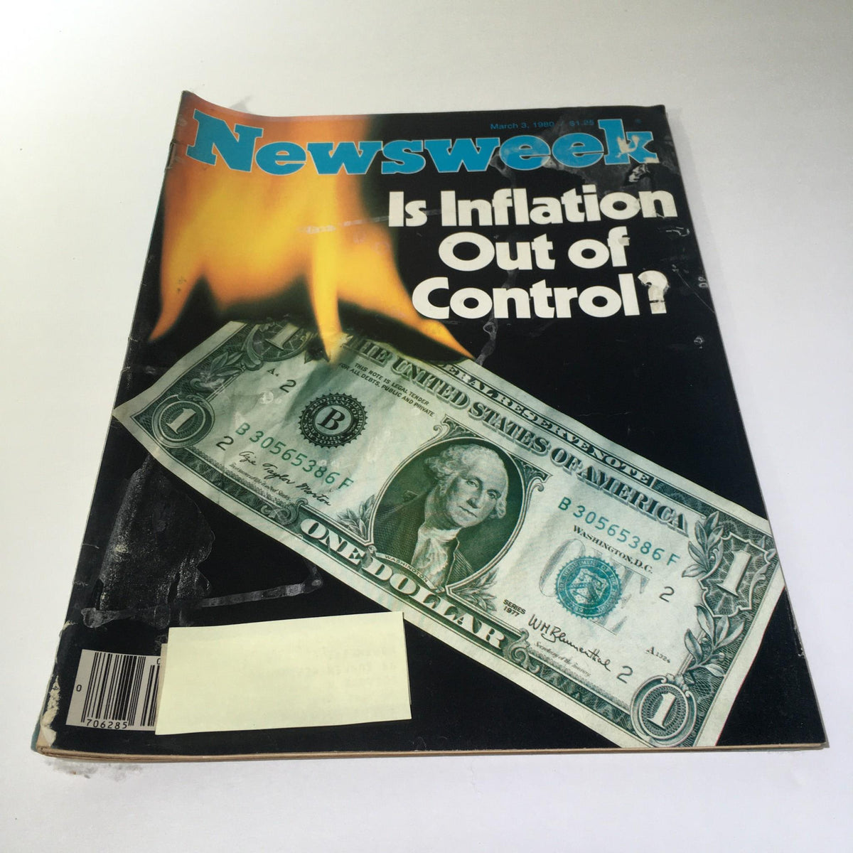 Cover of Newsweek Magazine from March 3, 1980, featuring the headline 'Is Inflation Out of Control?' with a visual of a burning dollar bill, symbolizing economic concerns of the era.