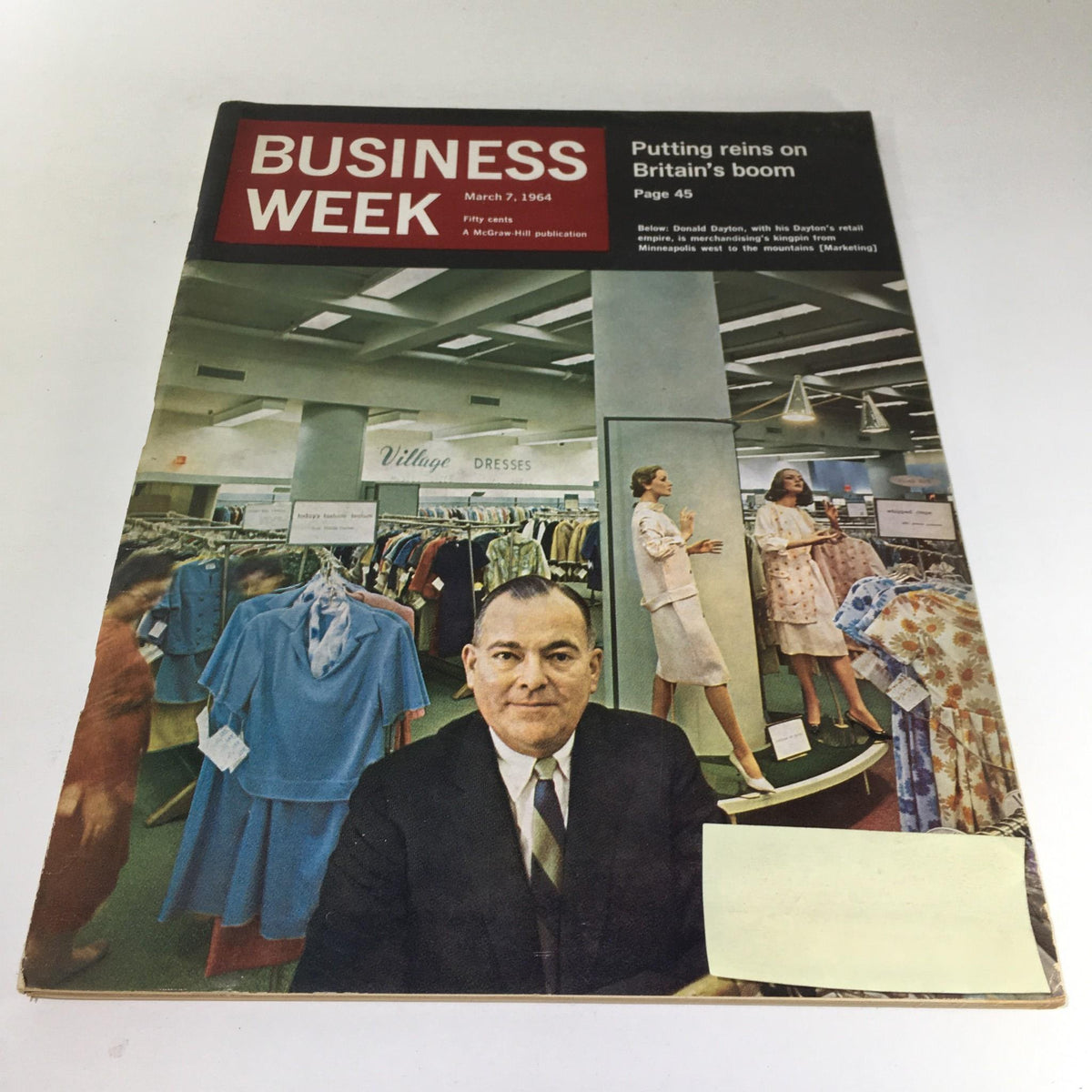Business Week Magazine cover from March 7, 1964, featuring Donald Dayton with Dayton's Retail, showcasing a retail setting with clothing racks and mannequins. The image highlights the business themes of that era.