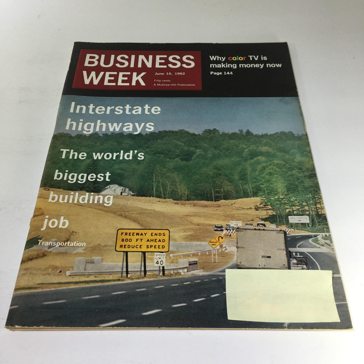 Cover of Business Week Magazine: June 16, 1962, featuring an article titled 'The World's Biggest Job: Interstate Highways.' The image depicts a landscape of construction for highways, with traffic signs and vehicles, reflecting 1960s American infrastructure development.