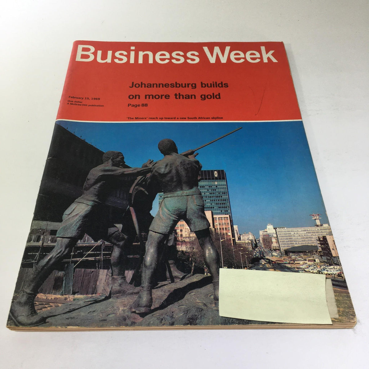 Cover of Business Week Magazine from February 15, 1969, featuring the headline 'Johannesburg builds on more than gold' and an image of bronze sculptures representing miners against an urban backdrop.