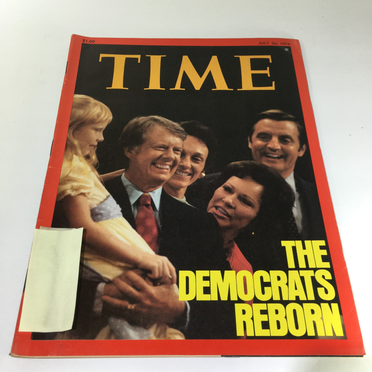 Vintage Time Magazine cover from July 26, 1976, titled 'The Democrats Reborn,' featuring a group of smiling individuals, including a child, showcasing a moment of political significance in American history.